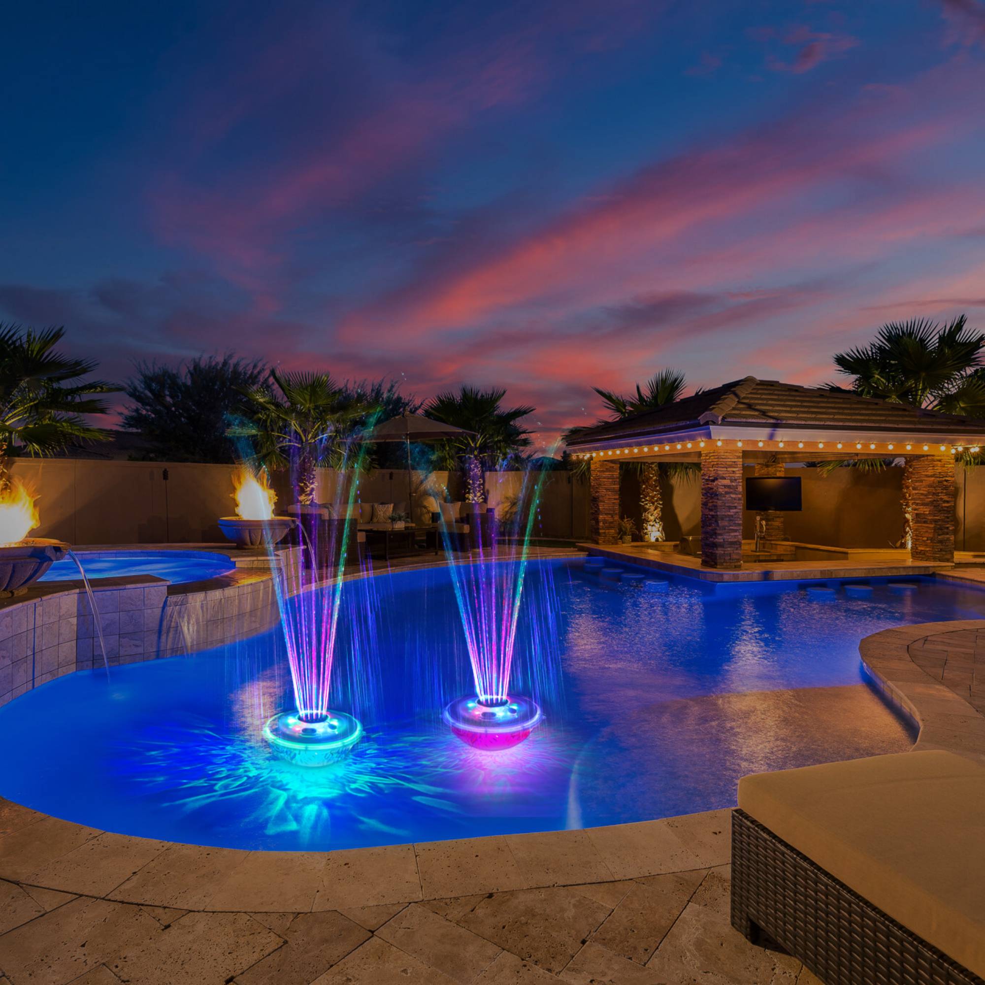 Wave Spas Rechargeable Pool Fountain with underwater light show – floating LED spa accessory with multi-color spray and bottom-projecting lights.